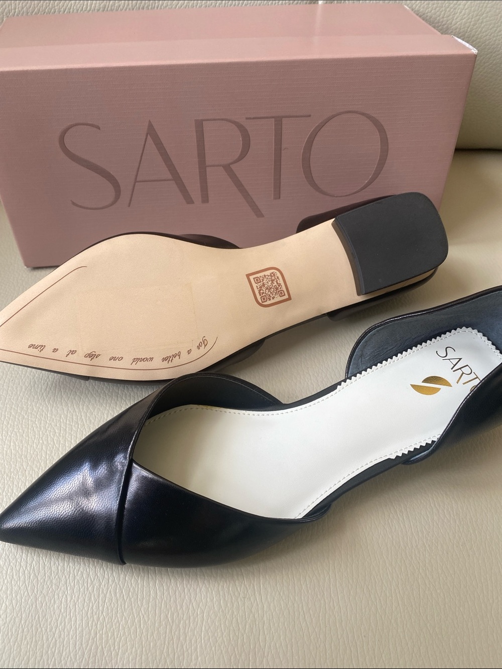 Black leather flats by SARTO